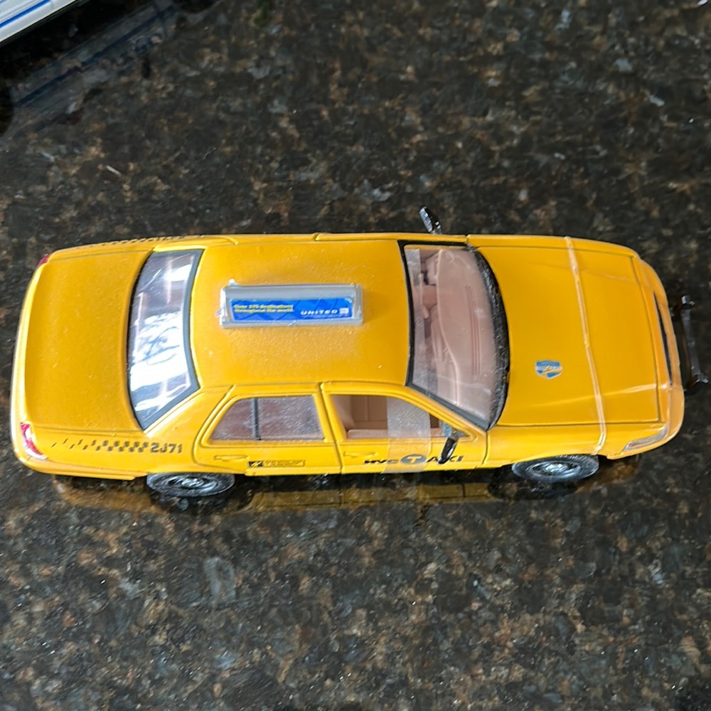 Vintage NYC Taxi Cab Toy Car